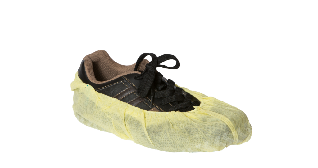 Outdoor utility shoe with white cover.