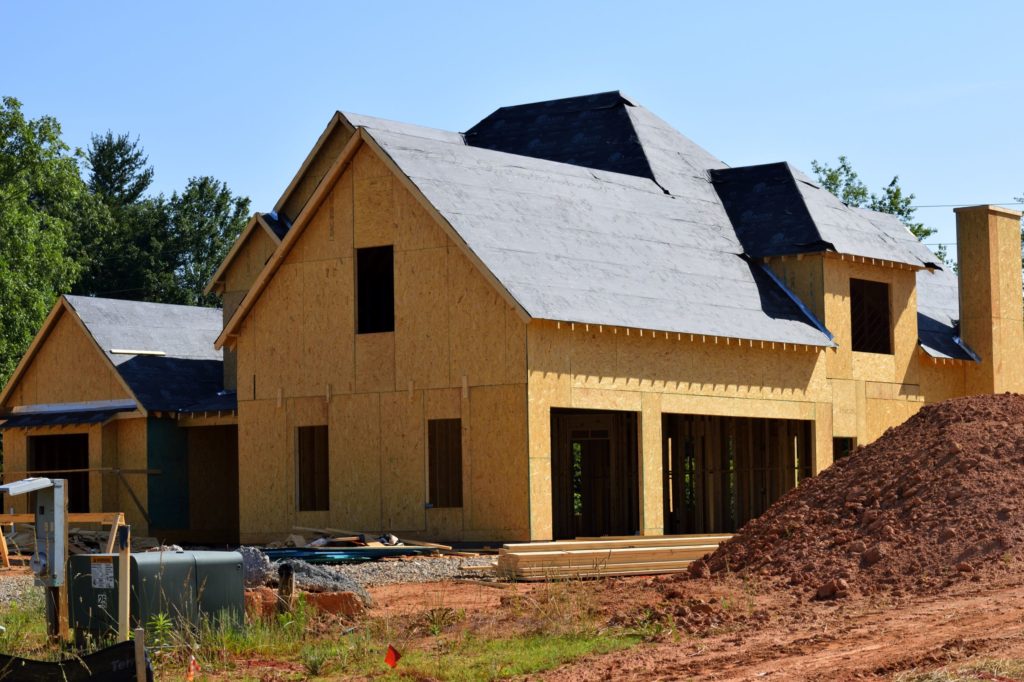 Exterior view of suburban home that is still under construction.